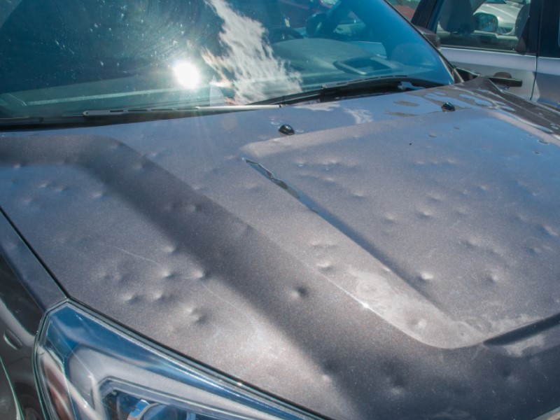 Dents on a car wizhout hail protection.